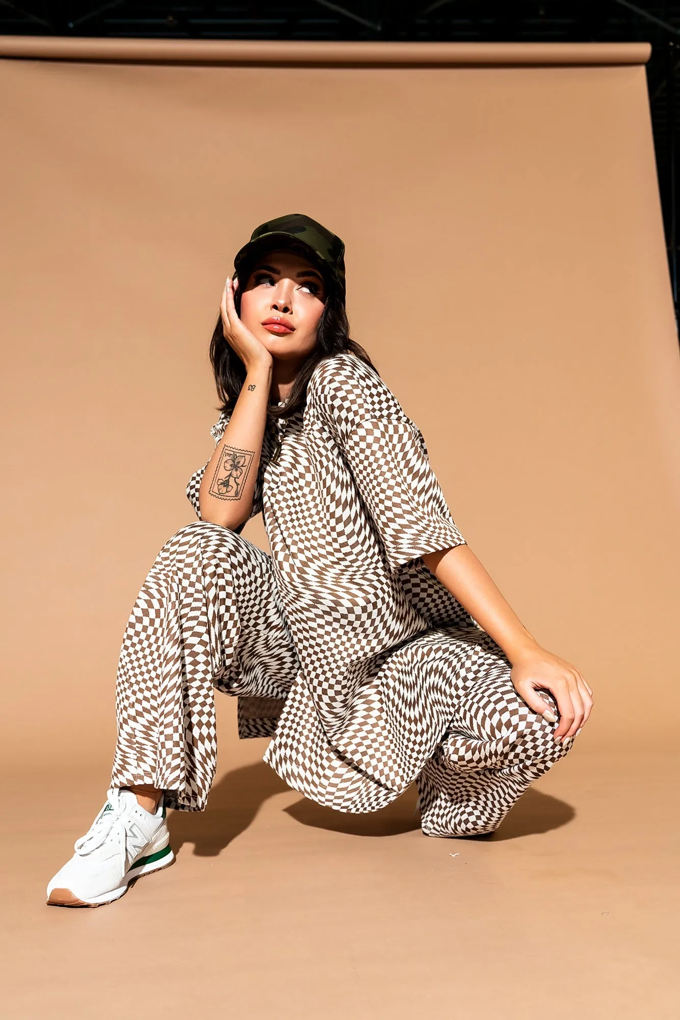 Leveled Up Double Knit Playsuit in Groovy Brown Checker