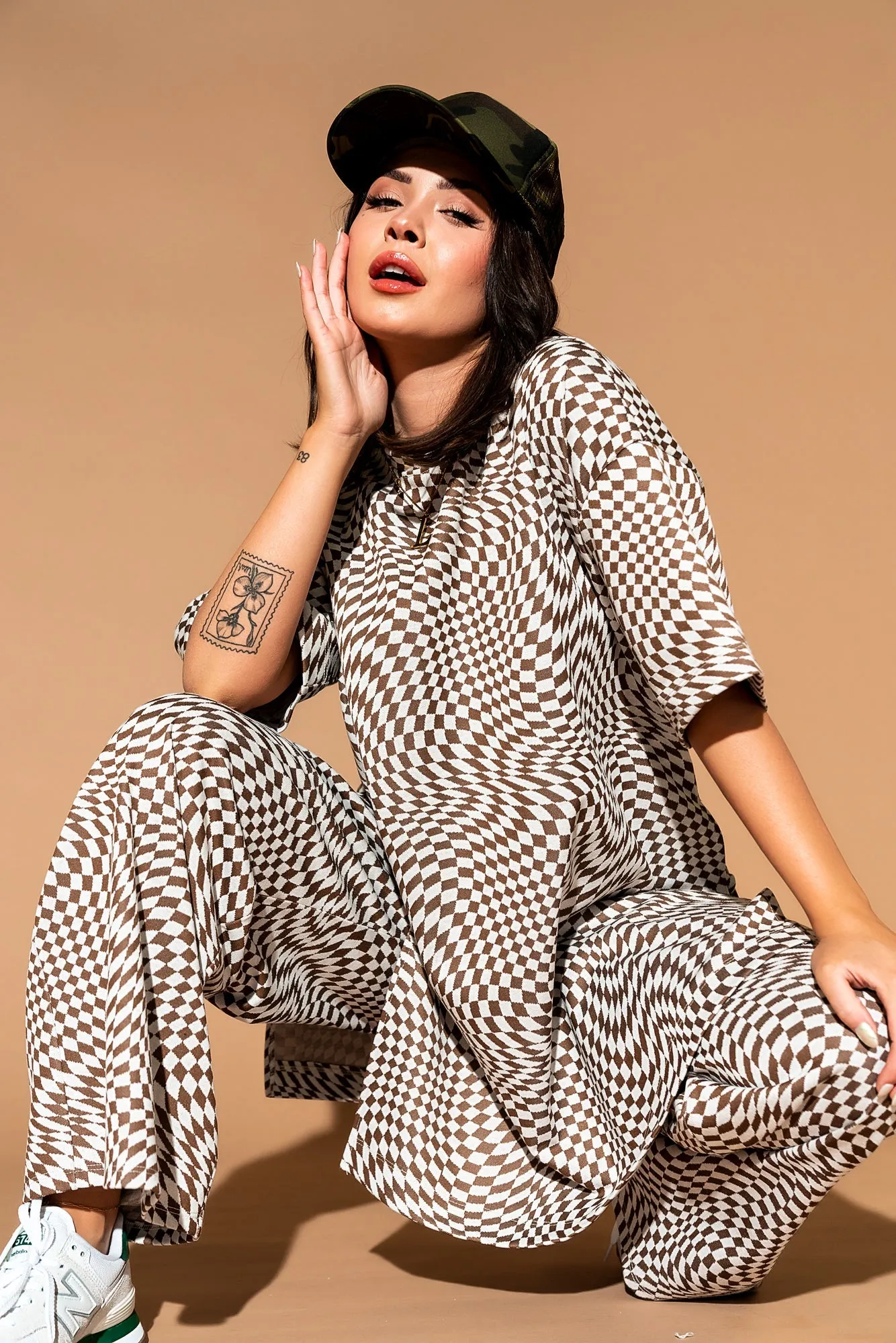 Leveled Up Double Knit Playsuit in Groovy Brown Checker